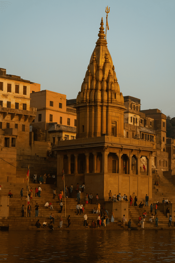Kashi Vishwanath Mandir: Shiv Bhakti, Moksha Or Ganga Aarti Ka Adbhut Sangam 1 “Kashi Vishwanath Mandir ka divya drishya – Ganga ghat ke paas sthit, bhakton se ghira hua, shaam ke samay ki shanti aur bhakti se bhara hua mahal.”